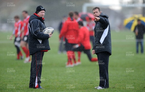 23.06.10 - Wales Rugby Training - Kicking coach Neil Jenkins and Backs coach Rob Howley during training. 
