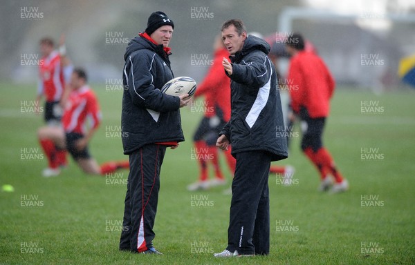 23.06.10 - Wales Rugby Training - Kicking coach Neil Jenkins and Backs coach Rob Howley during training. 