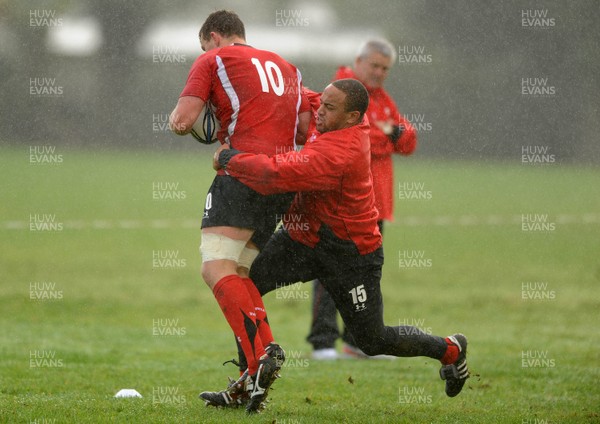 23.06.10 - Wales Rugby Training - Deiniol Jones is tackled by Gavin Thomas during training. 