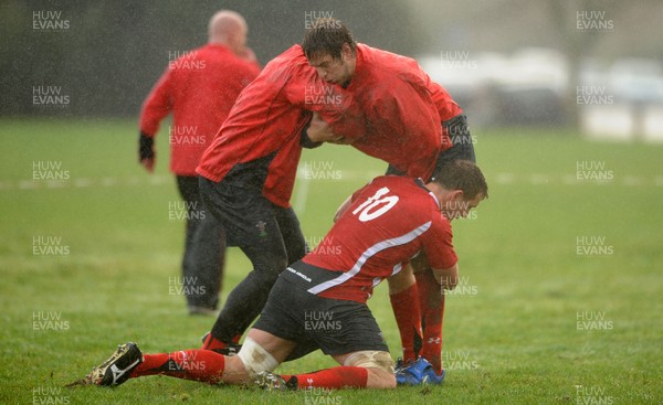 23.06.10 - Wales Rugby Training - Ryan Jones is tackled by Deiniol Jones and Gavin Thomas during training. 
