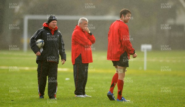 23.06.10 - Wales Rugby Training - Kicking coach Neil Jenkins, Head coach Warren Gatland and Ryan Jones look on during training. 