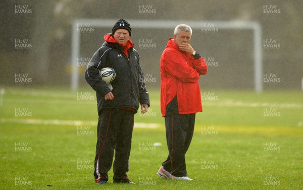 23.06.10 - Wales Rugby Training - Kicking coach Neil Jenkins and Head coach Warren Gatland look on during training. 