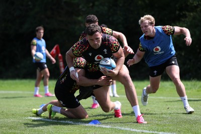 230626 - Wales Rugby Training ahead of their game against the Barbarians on the weekend - Mason Grady during training