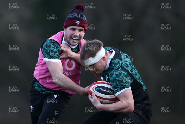 240124 - Wales Rugby Training in the first week of the Guinness 6 Nations - Ioan Lloyd and Nick Tompkins during training