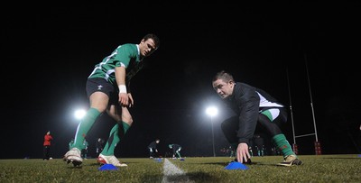 24.02.10 - Wales Rugby Training - Jamie Roberts and Shane Williams in action during a night training session in preparation for Wales Friday night match against France. 