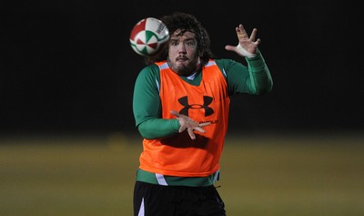 24.02.10 - Wales Rugby Training - Adam Jones takes a pass during a night training session in preparation for Wales Friday night match against France. 