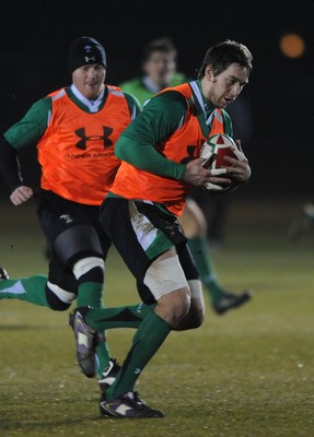 24.02.10 - Wales Rugby Training - Ryan Jones is supported by Martyn Williams during a night training session in preparation for Wales Friday night match against France. 