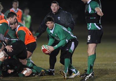 24.02.10 - Wales Rugby Training - Mike Phillips makes a pass during a night training session in preparation for Wales Friday night match against France. 