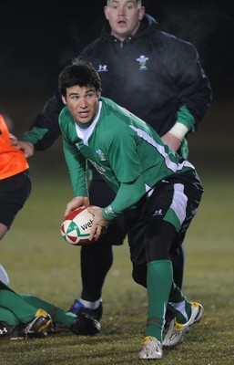 24.02.10 - Wales Rugby Training - Mike Phillips makes a pass during a night training session in preparation for Wales Friday night match against France. 