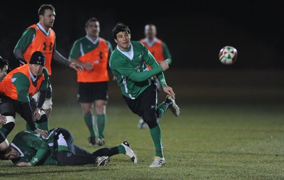 24.02.10 - Wales Rugby Training - Mike Phillips makes a pass during a night training session in preparation for Wales Friday night match against France. 
