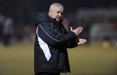 24.02.10 - Wales Rugby Training - Head coach Warren Gatland makes a point during a night training session in preparation for Wales Friday night match against France. 