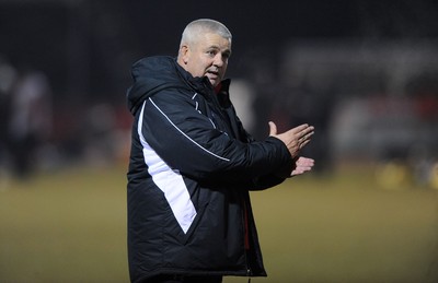 24.02.10 - Wales Rugby Training - Head coach Warren Gatland makes a point during a night training session in preparation for Wales Friday night match against France. 