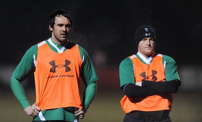 24.02.10 - Wales Rugby Training - Flankers Jonathan Thomas and Martyn Williams during a night training session in preparation for Wales Friday night match against France. 