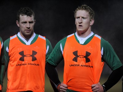 24.02.10 - Wales Rugby Training - Second row Bradley Davies and Deiniol Jones during a night training session in preparation for Wales Friday night match against France. 