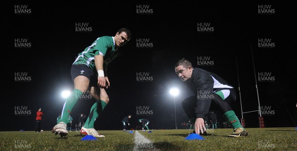 24.02.10 - Wales Rugby Training - Jamie Roberts and Shane Williams in action during a night training session in preparation for Wales Friday night match against France. 