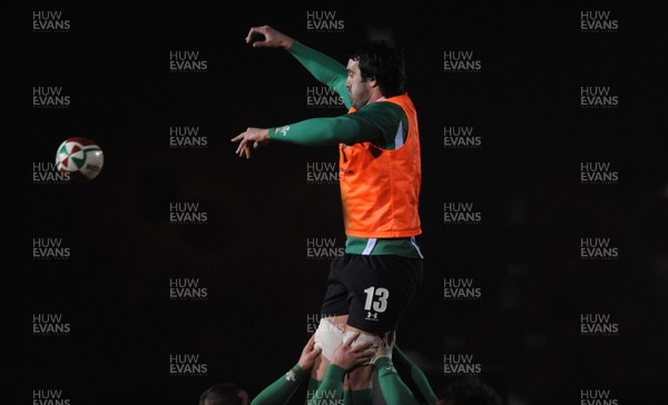 24.02.10 - Wales Rugby Training - Jonathan Thomas takes line-out ball during a night training session in preparation for Wales Friday night match against France. 