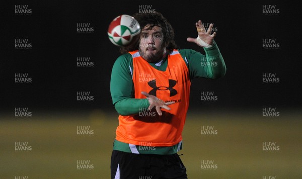 24.02.10 - Wales Rugby Training - Adam Jones takes a pass during a night training session in preparation for Wales Friday night match against France. 
