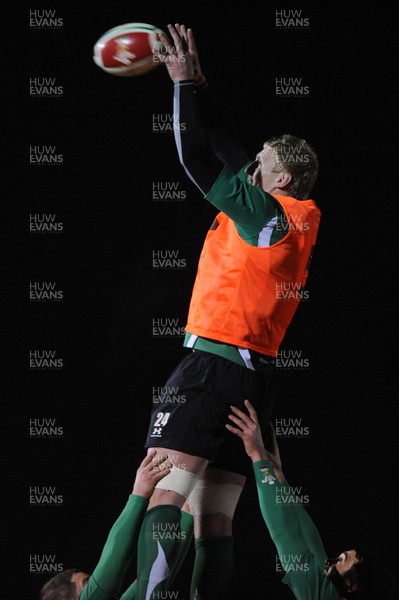 24.02.10 - Wales Rugby Training - Bradley Davies takes line-out ball during a night training session in preparation for Wales Friday night match against France. 