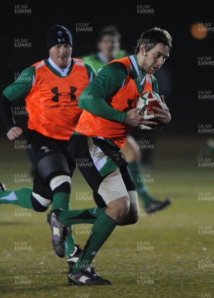 24.02.10 - Wales Rugby Training - Ryan Jones is supported by Martyn Williams during a night training session in preparation for Wales Friday night match against France. 
