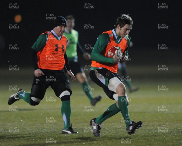 24.02.10 - Wales Rugby Training - Ryan Jones is supported by Martyn Williams during a night training session in preparation for Wales Friday night match against France. 