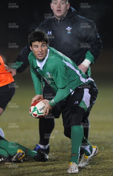24.02.10 - Wales Rugby Training - Mike Phillips makes a pass during a night training session in preparation for Wales Friday night match against France. 