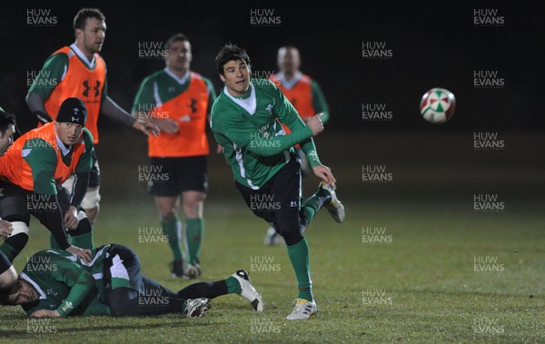 24.02.10 - Wales Rugby Training - Mike Phillips makes a pass during a night training session in preparation for Wales Friday night match against France. 