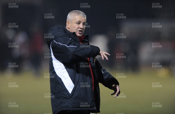24.02.10 - Wales Rugby Training - Head coach Warren Gatland makes a point during a night training session in preparation for Wales Friday night match against France. 