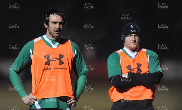 24.02.10 - Wales Rugby Training - Flankers Jonathan Thomas and Martyn Williams during a night training session in preparation for Wales Friday night match against France. 