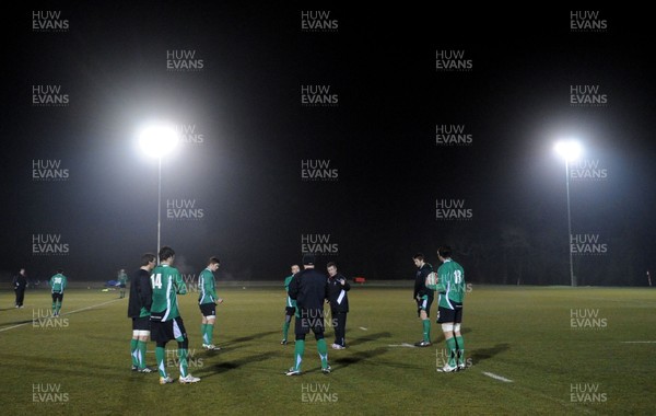 24.02.10 - Wales Rugby Training - Backs coach Rob Howley talks to players during a night training session in preparation for Wales Friday night match against France. 