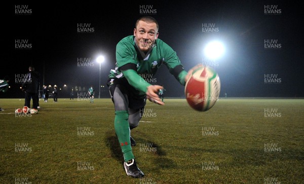 24.02.10 - Wales Rugby Training - Richie Rees gets the ball away during a night training session in preparation for Wales Friday night match against France. 