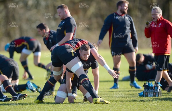 240216 - Wales Rugby Training -Alun Wyn Jones and Dan Lydiate (ground)  during training