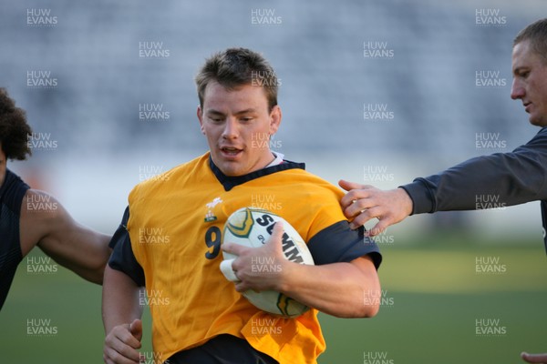 24.05.07  Wales rugby on Tour to Australia Matthew Rees gets between Colin Charvis and Brent Cockbain at the  Blue Tongue Stadium in Gosford 
