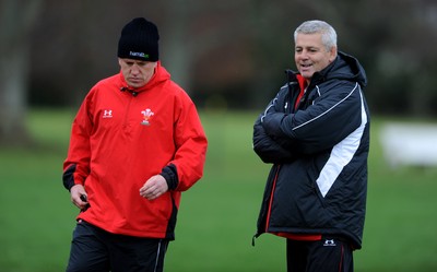 24.06.10 - Wales Rugby Training - Defence coach Shaun Edwards and and Head coach Warren Gatland during training. 