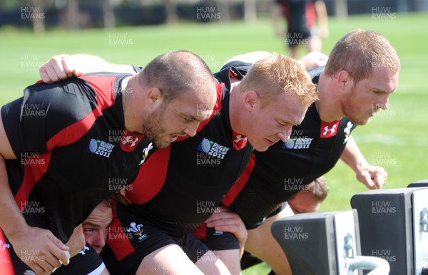 24.09.11 - Wales Rugby Training - (L-R) Craig Mitchell, Lloyd Burns and Gethin Jenkins during training. 