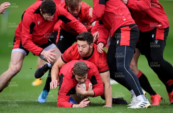 241120 - Wales Rugby Training - Leigh Halfpenny is tackled by Rhys Webb during training