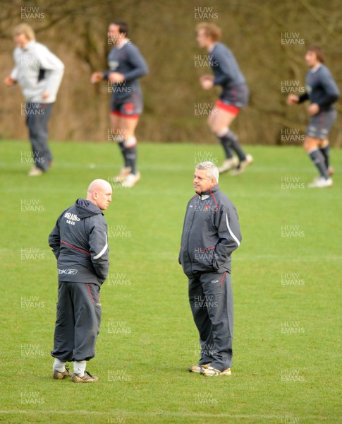 25.01.08 - Wales Rugby Training- Wales Coach, Warren Gatland looks on with assistant, Shaun Edwards(L) 