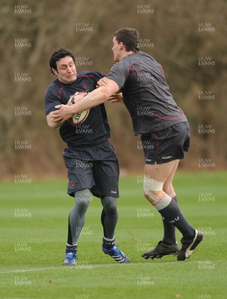 25.01.08 - Wales Rugby Training- Stephen Jones is tackled by Ian Evans 
