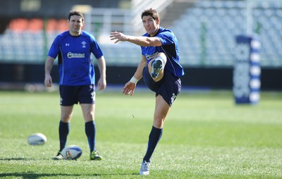 24.02.11 - Wales Rugby Training - James Hook kicks as Stephen Jones looks on during training. 