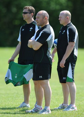 25.05.09 - Wales Rugby Training - Head coach, Robin McBryde looks on with defence coach, Sean Holley(L) and attack coach, Neil Jenkins(R) during training. 
