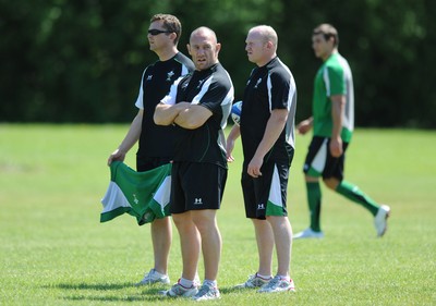 25.05.09 - Wales Rugby Training - Head coach, Robin McBryde looks on with defence coach, Sean Holley(L) and attack coach, Neil Jenkins(R) during training. 