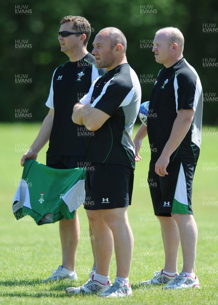 25.05.09 - Wales Rugby Training - Head coach, Robin McBryde looks on with defence coach, Sean Holley(L) and attack coach, Neil Jenkins(R) during training. 