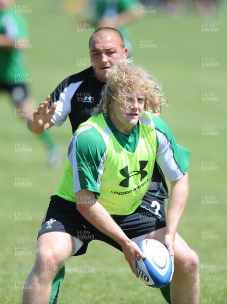 25.05.09 - Wales Rugby Training - Duncan Jones is tackled by Craig Mitchell during training. 