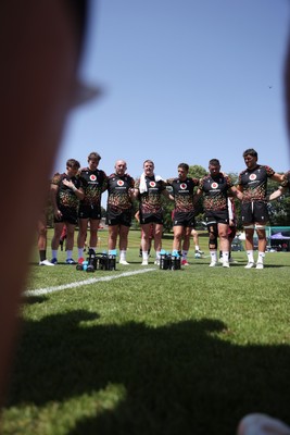 250626 - Wales Rugby Training ahead of their game against the Barbarians at Twickenham on Saturday - Dewi Lake speaks in the team huddle
