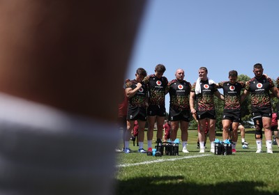 250626 - Wales Rugby Training ahead of their game against the Barbarians at Twickenham on Saturday - Dewi Lake speaks in the team huddle