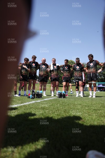 250626 - Wales Rugby Training ahead of their game against the Barbarians at Twickenham on Saturday - Dewi Lake speaks in the team huddle
