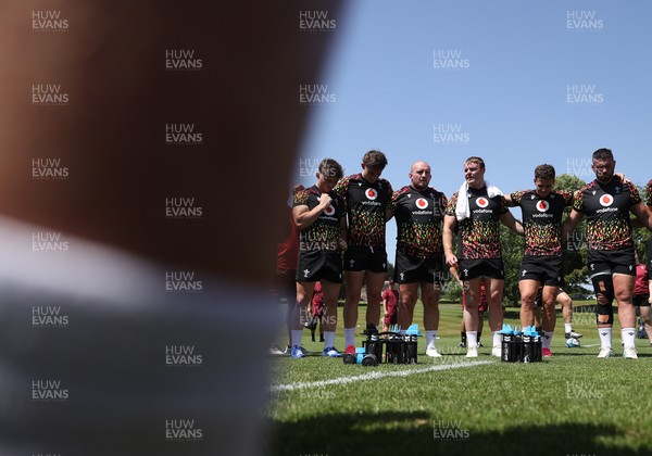 250626 - Wales Rugby Training ahead of their game against the Barbarians at Twickenham on Saturday - Dewi Lake speaks in the team huddle