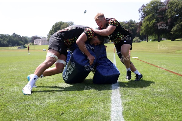 250626 - Wales Rugby Training ahead of their game against the Barbarians at Twickenham on Saturday - Teddy Williams and Rhys Barratt during training