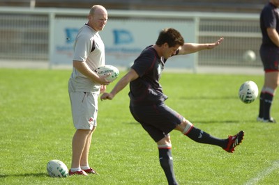 25.09.07 - Wales Rugby World Cup Training - Kicking Coach, Neil Jenkins watches Ceri Sweeney during training 