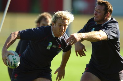 25.09.07 - Wales Rugby World Cup Training - Alix Popham is tackled by Ian Gough 