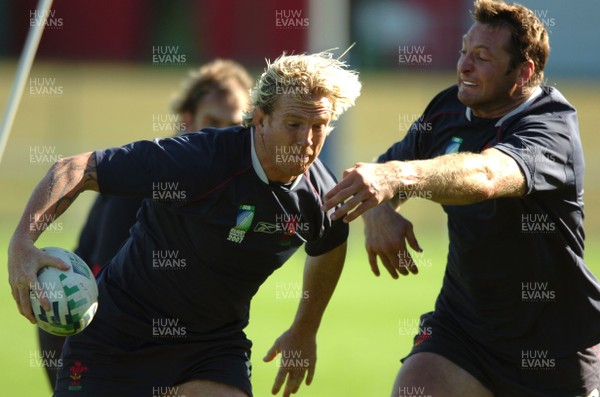 25.09.07 - Wales Rugby World Cup Training - Alix Popham is tackled by Ian Gough 